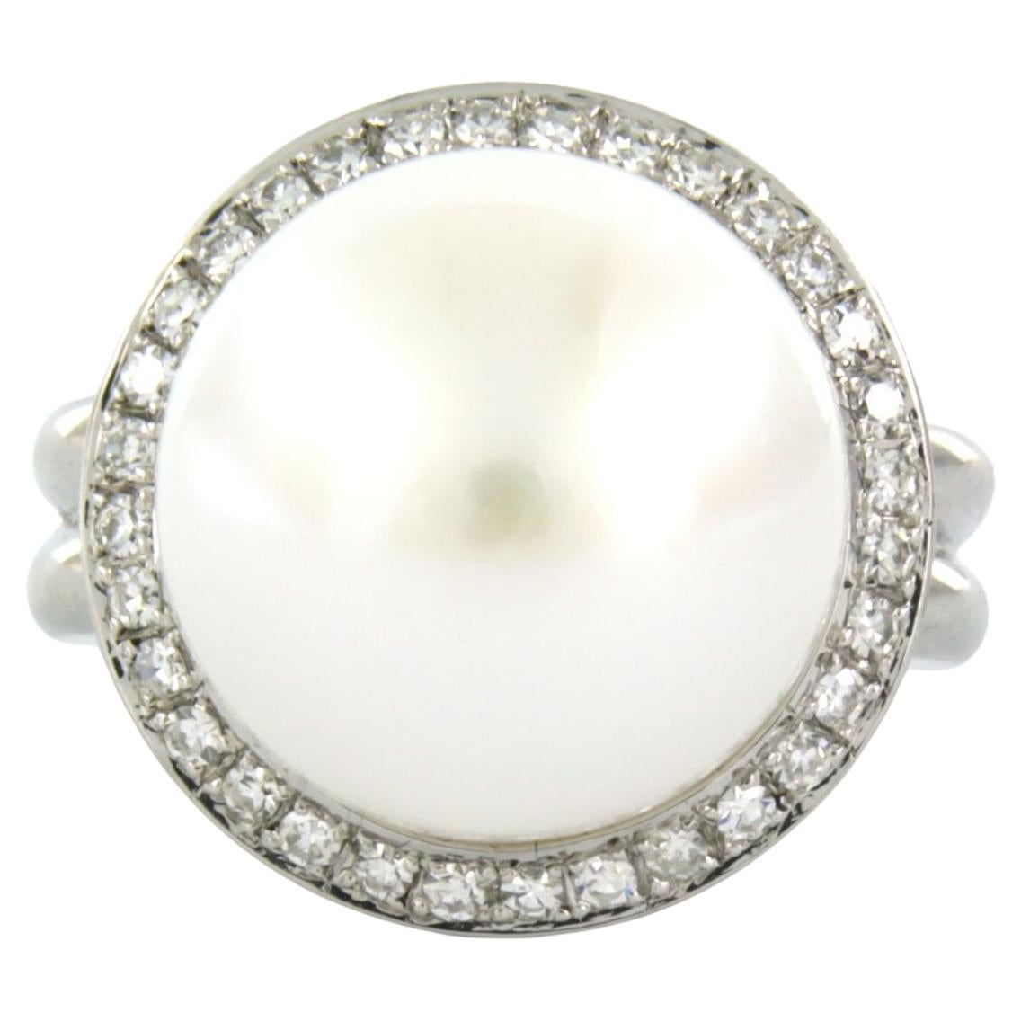 Anello con perla e diamanti taglio singolo fino a 0,64ct 14,2 grammi oro bianco 18k
