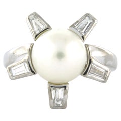 Anello con perla e diamanti a taglio conico fino a 0,45 carati in oro 18 carati 6,2 grammi