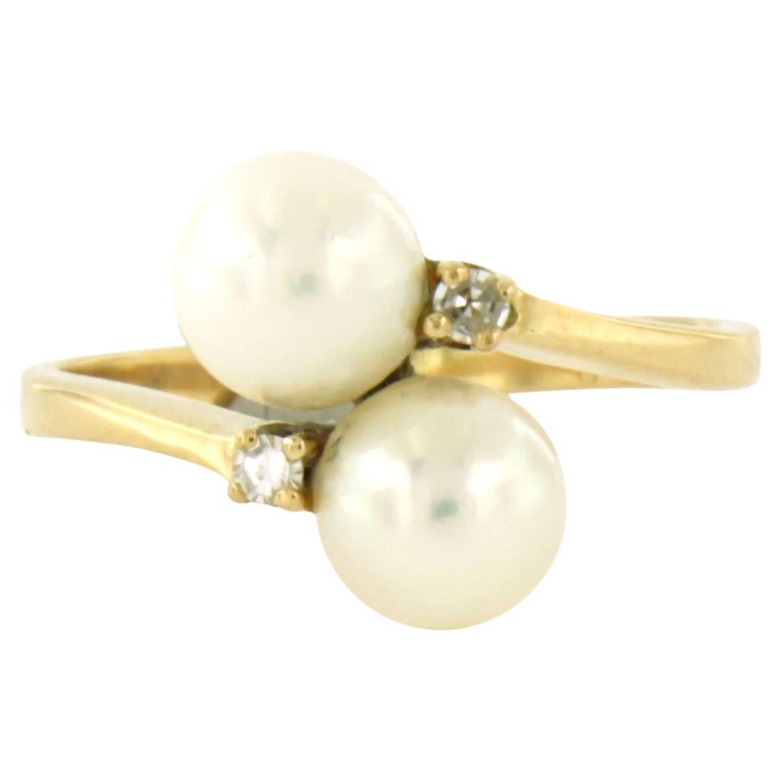 Anello con perle e diamanti taglio singolo fino a 0,03ct in oro giallo 18k