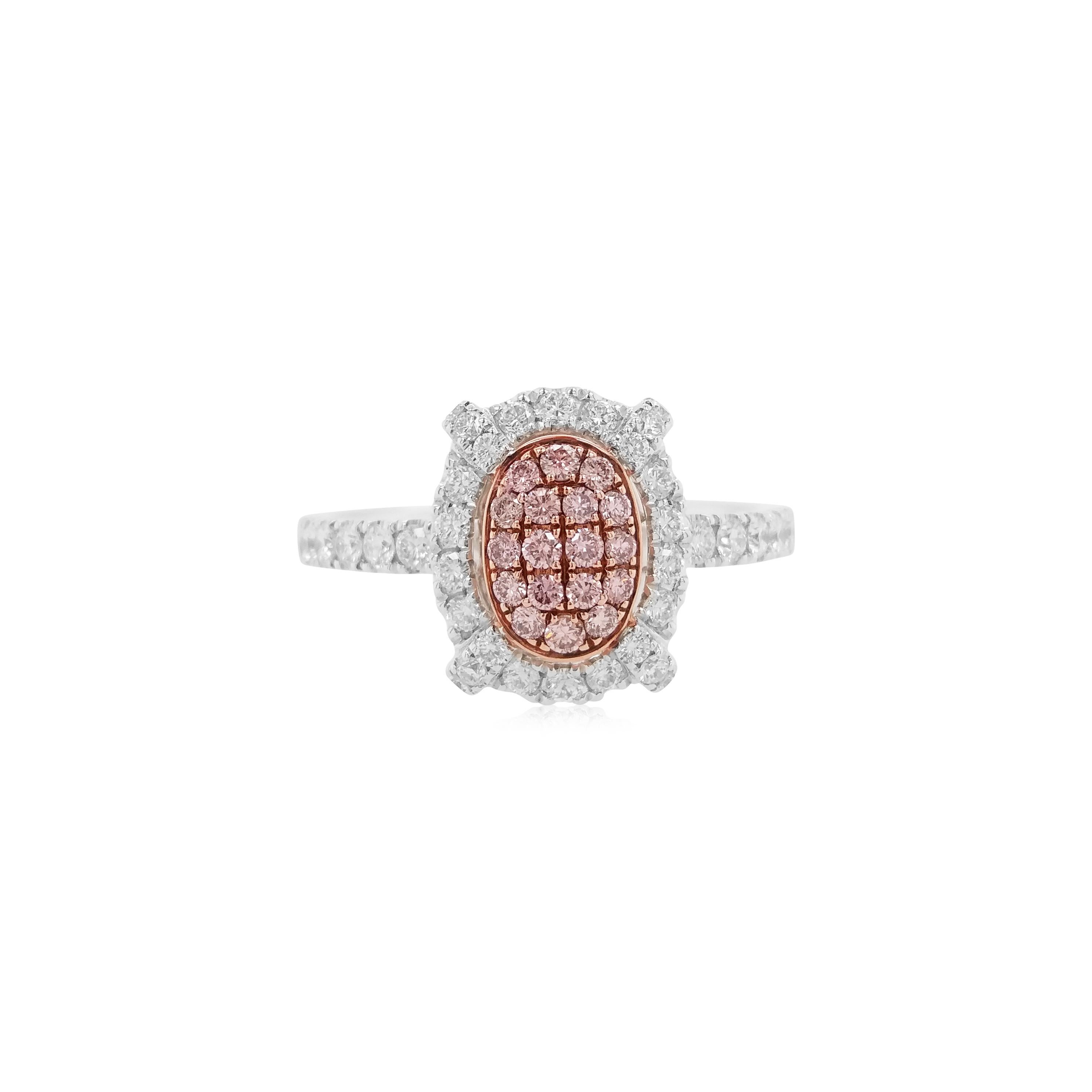 Eleganter und zart gestalteter Ring mit natürlichen rosa Diamanten und weißen Diamanten, gefasst in Platin und Gold.

Natürliche rosa Diamanten im Brillantschliff - 0.15 Karat
Runder weißer Diamant im Brillantschliff - 0.43 ct
Hergestellt in Gold