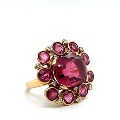 Ring with Pink Tourmalines & Diamonds in 18 Karat Yellow Gold by Meinrad Burch