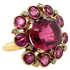 Ring with Pink Tourmalines & Diamonds in 18 Karat Yellow Gold by Meinrad Burch