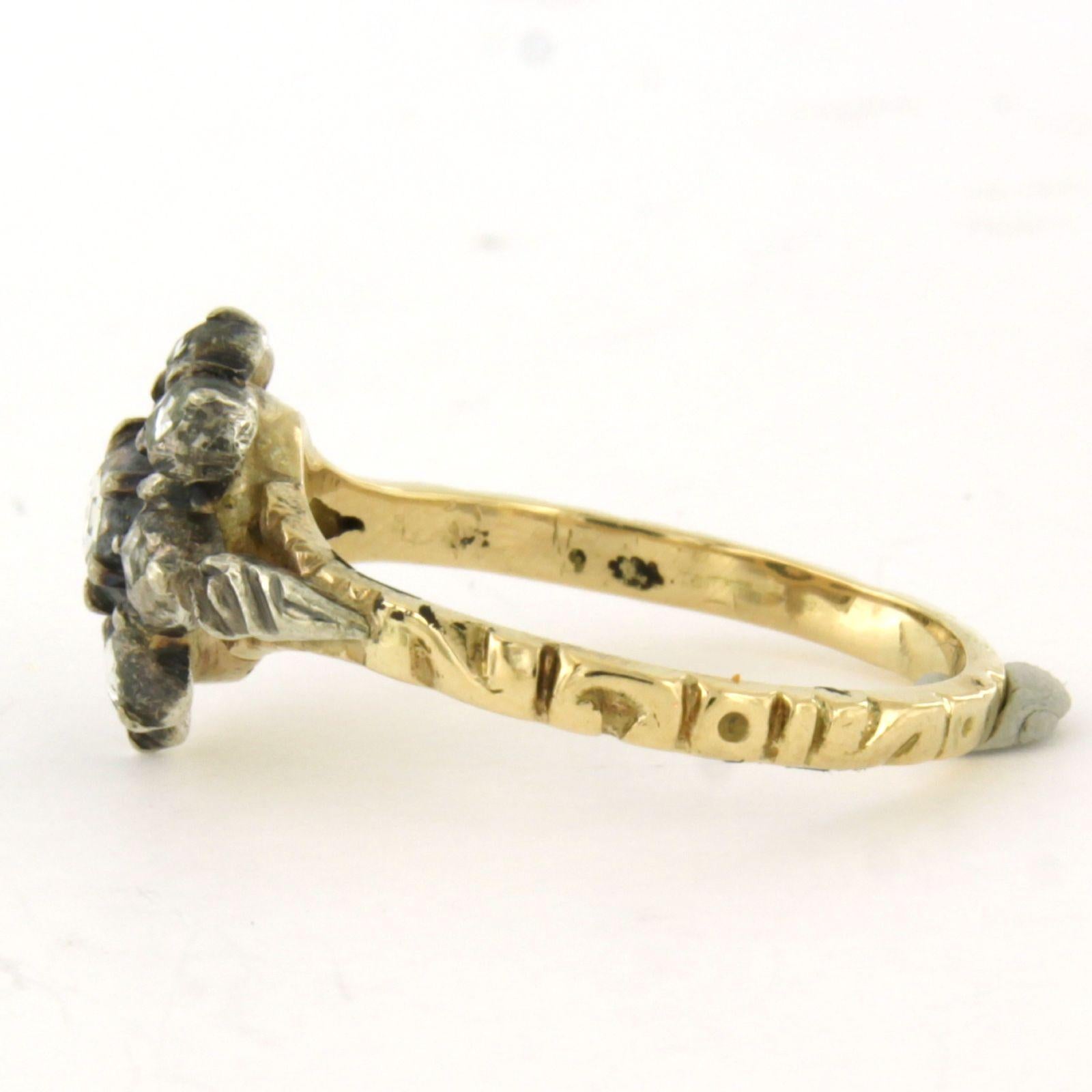 14k yellow gold and silver ring set with rose-cut diamonds up to 0.20 ct - G/H - SI - ring size US 9 - EU 19 (60)

Detailed description

The top of the ring is 1.2 cm wide and 5.5 mm high.

Ring size US 9 - EU 19 (60). The ring can be enlarged or