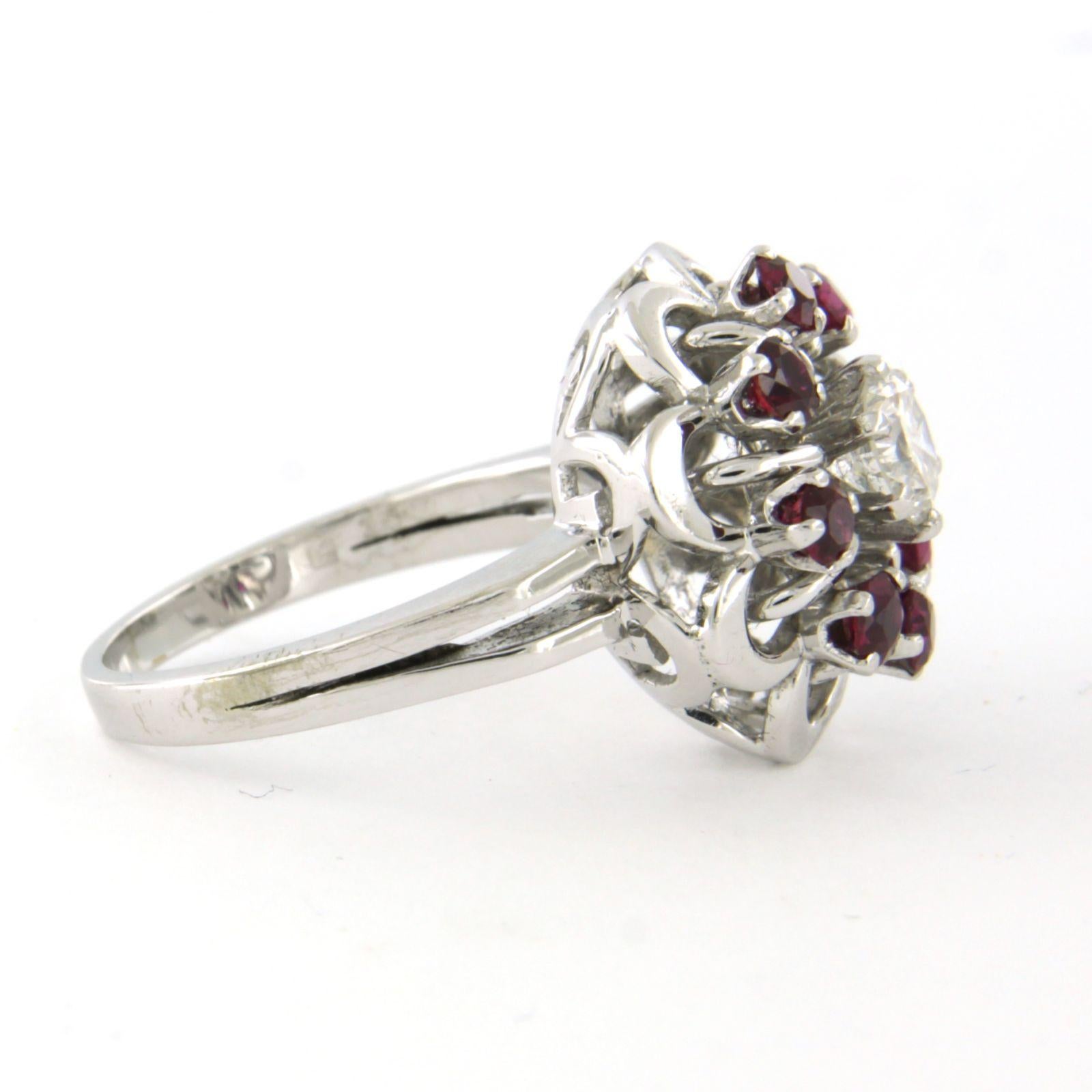 Ring aus 18 Karat Weißgold, besetzt mit einem Rubin und einem Diamanten im Brillantschliff von bis zu 0,51 ct - G/H - SI - Ringgröße US 7 - EU 17.25 (54)

Ausführliche Beschreibung:

Die Spitze des Rings ist oval, 1,7 cm breit und 1,0 cm