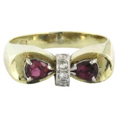 Bague avec rubis et diamants taille brillant jusqu'à 0,05ct or 14k 5,0 grammes