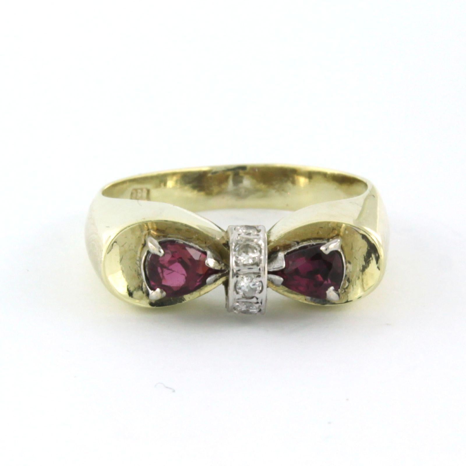 14 kt bicolour gold ring set with ruby ​​and brilliant cut diamonds. 0.10 ct - F/G - SI - ring size U.S. 7 - EU. 17.25(54)

detailed description:

the top of the ring is 6.2 mm wide

weight 5.0 grams

ring size U.S. 7 - EU. 17.25(54), ring can be