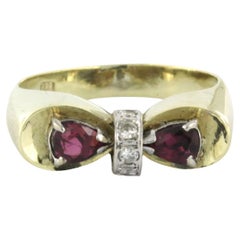 Ring with ruby and diamonds 14k bicolor gold