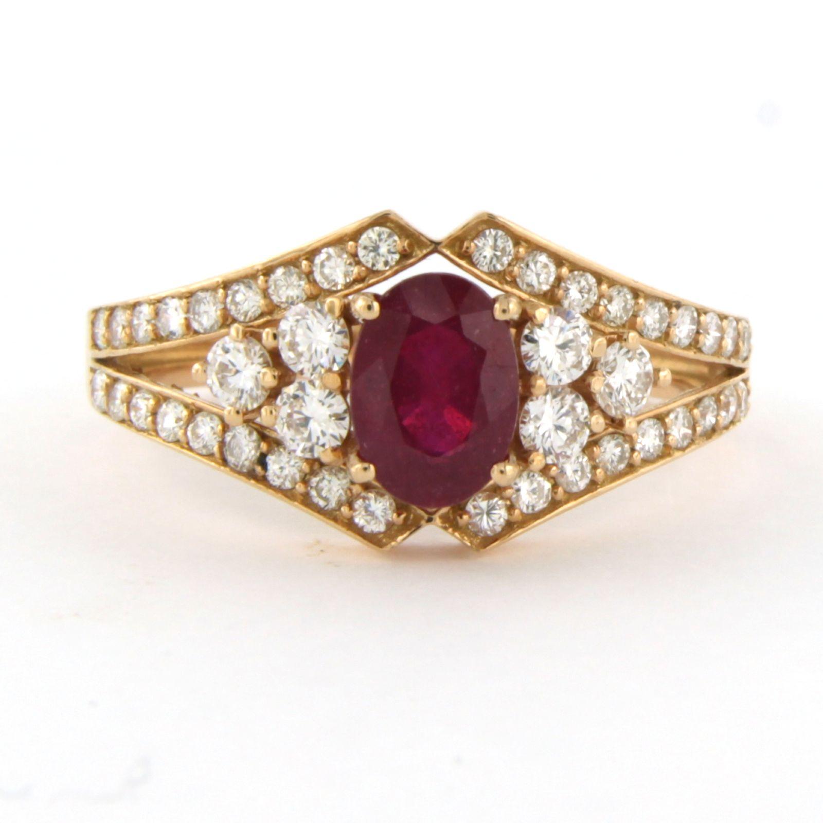 18k pink gold ring set with ruby. 1.18ct and brilliant cut diamonds up to. 0.64ct - F/G - VS/SI - ring size U.S. 7.25 - EU. 17.5(55)

detailed description

the top of the ring is 1.0 cm wide

ring size U.S. 7.25 - EU. 17.5(55), the ring can be