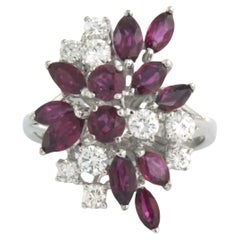 Ring with ruby and diamonds 18k white gold