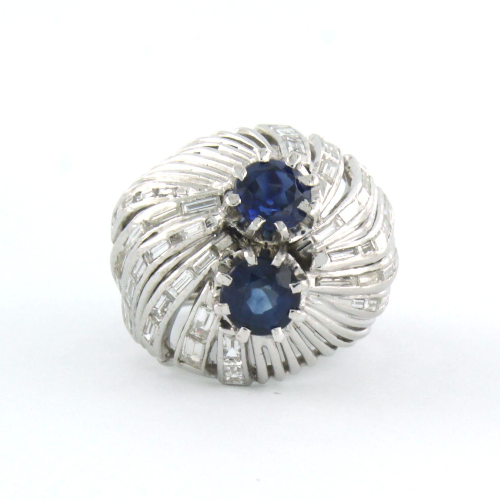 14k white gold ring set with sapphire and baguette cut diamonds up to 0.50ct - F/G - VS/SI - ring size US 3.75 - EU 14.75(46)

detailed description:

the top of the ring is 1.8 cm wide by 1.0 cm high

total weight: 10.9 grams

ring size US 3.75 - EU