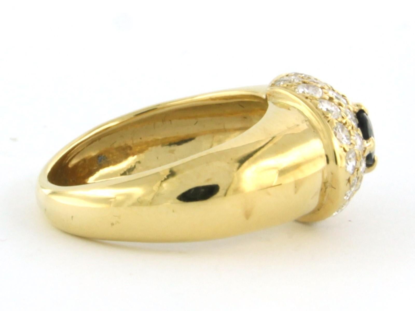 Ring aus 18kt Gelbgold, besetzt mit Saphiren und Diamanten im Brillantschliff 0,78 Karat F/G VS/SI - Ringgröße U.S. 4 - EU 15(47)

ausführliche Beschreibung

Die Oberseite des Rings ist 9,5 mm breit und 6,8 mm hoch.

Gewicht 6,6 Gramm

Ringgröße