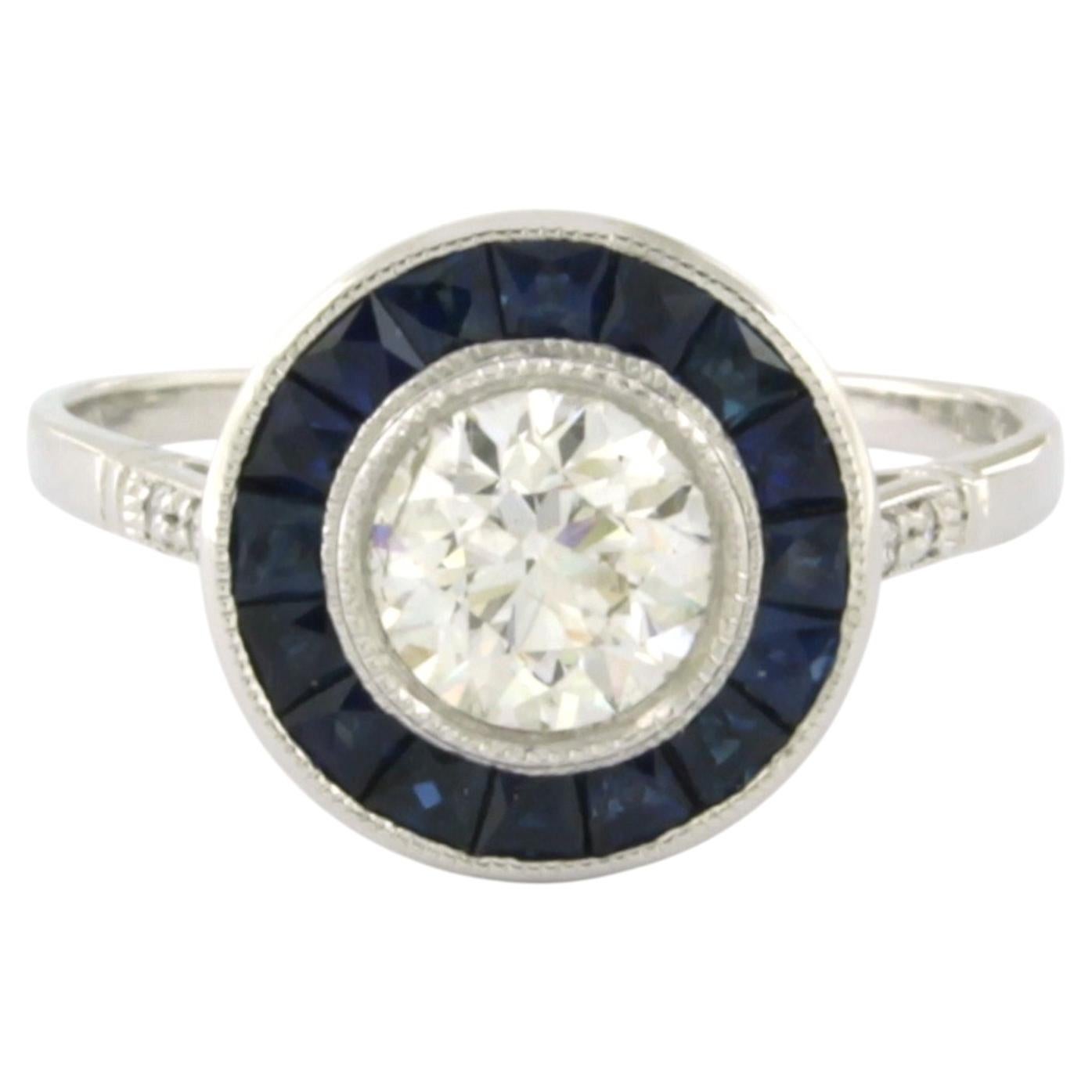 Ring with sapphire and brilliant cut diamonds up o 0.86ct platinum 3.6 grams