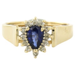 Anello con zaffiro e diamanti taglio brillante fino a 0,05 ct in oro 14k 3,2 grammi