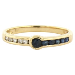 Anello con zaffiro e diamanti taglio brillante fino a 0,10 ct. in oro 14k 1,9 grammi