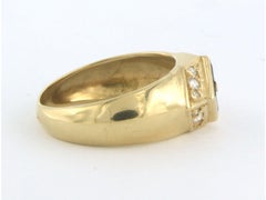 Ring with sapphire and brilliant cut diamonds up to 0.18ct 18k gold 4.9 grams