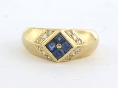 Ring with sapphire and brilliant cut diamonds up to 0.18ct 18k gold 4.9 grams