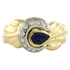 Ring mit Saphiren und Diamanten im Brillantschliff bis zu 0,19 Karat 18 Karat zweifarbigem Gold