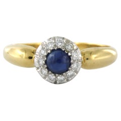 Ring with sapphire and brilliant cut diamonds up to 0.20ct 18k bicolour gold