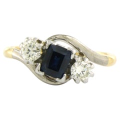 Ring with sapphire and brilliant cut diamonds up to 0.25ct 18k gold and platinum