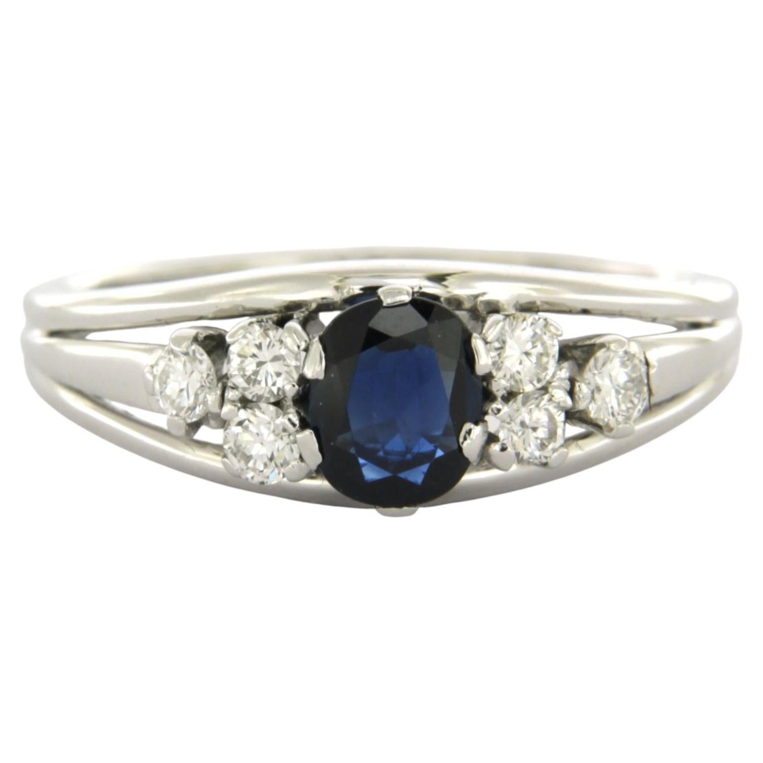 Ring with sapphire and brilliant cut diamonds up to 0.25ct 18k gold