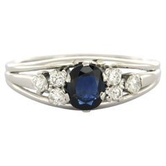 Ring with sapphire and brilliant cut diamonds up to 0.25ct 18k gold