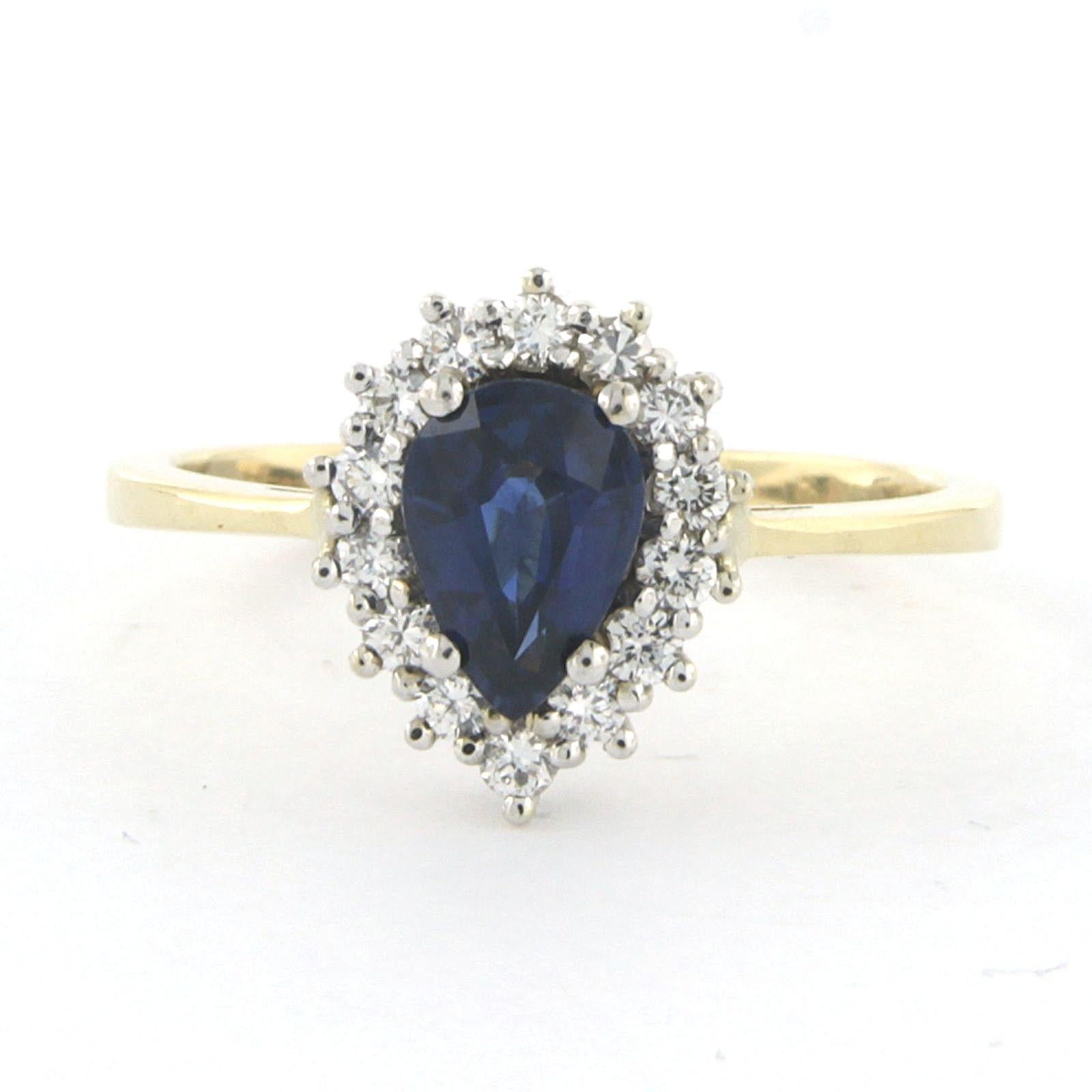 Ring aus 18k Bicolor-Gold, besetzt mit einem Saphir in der Mitte von bis zu 1,05ct und Diamanten im Brillantschliff von bis zu 0,32ct - F/G - VS/SI - Ringgröße US 7.25 - EU 17.5(55)

detaillierte Beschreibung:

Die Spitze des Rings hat die Form