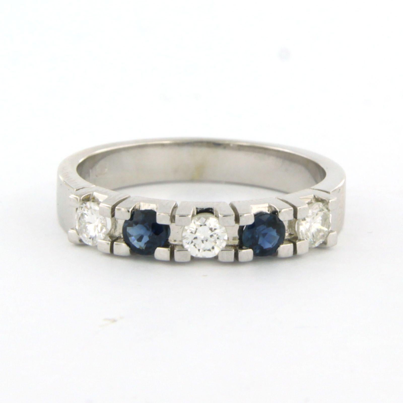 Bague en or blanc 14k sertie d'un saphir jusqu'à 0.30ct et d'un diamant taille brillant jusqu'à 0.33ct - F/G - VS/SI - taille de bague US 6.5 - EU 17(53)

description détaillée :

Le haut de l'anneau mesure 3,7 mm de large et 2,8 mm de haut.

Bague