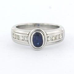 Ring with sapphire and brilliant cut diamonds up to 0.35ct 18k gold 9.8 grams