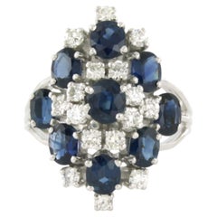 Bague en or 14 carats sertie d'un saphir et de diamants taille brilliante d'un poids total allant jusqu'à 0,36 ct