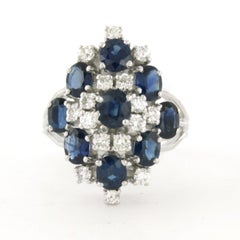 Ring with sapphire and brilliant cut diamonds up to 0.36ct 14k white gold