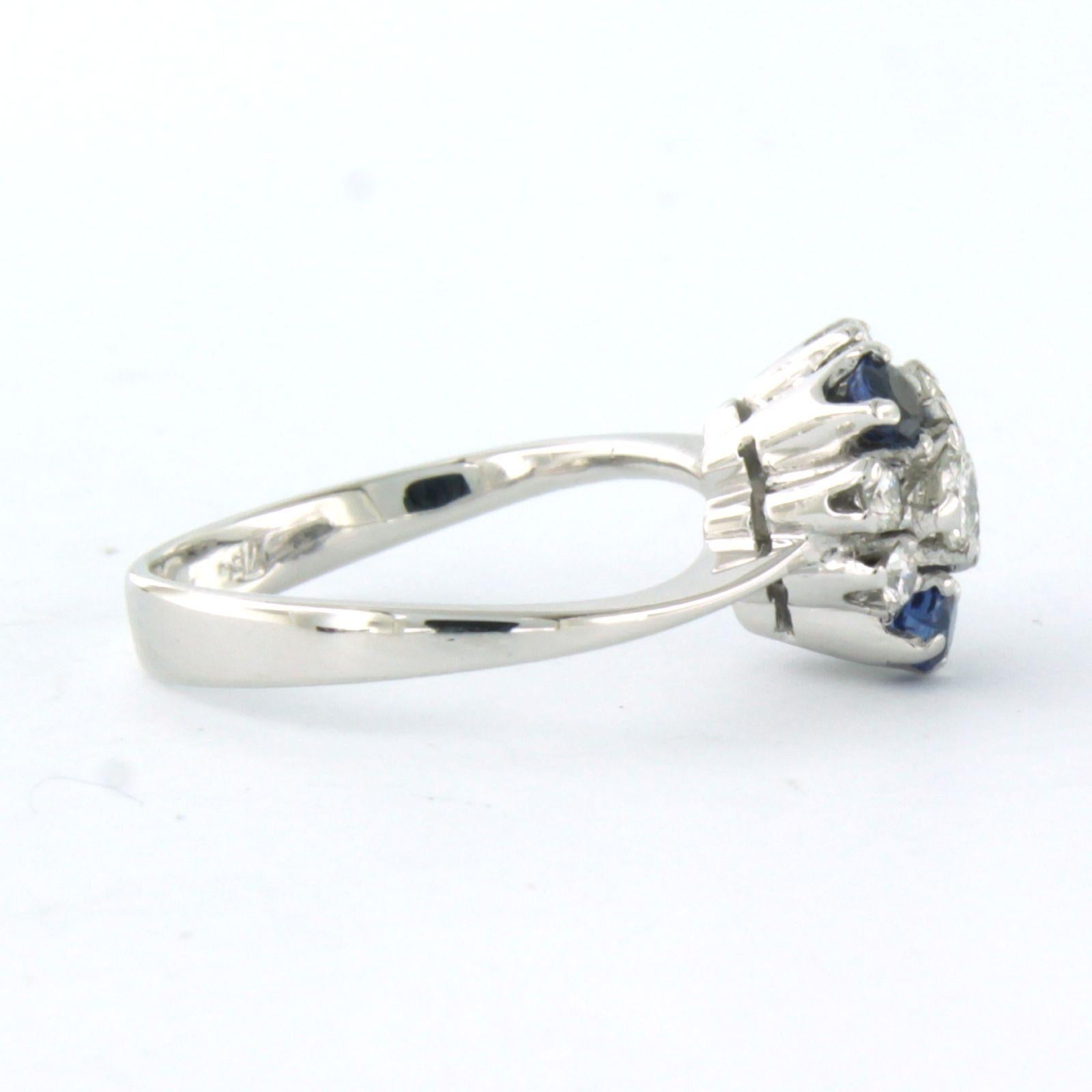 Ring aus 18k Weißgold, besetzt mit Saphir und Diamant im Brillantschliff (bis zu 0,50ct) - F - VS/SI - Ringgröße US 5.5 - EU 16 (50)

detaillierte Beschreibung:

die Oberseite des Rings ist 8,9 mm breit und 7,4 mm hoch

Gewicht 4,0 Gramm

Ringgröße