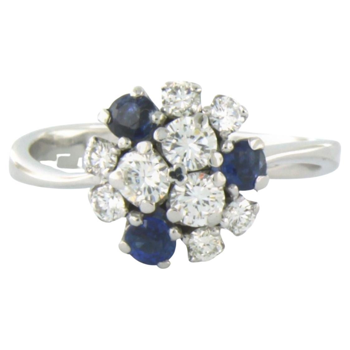 Ring with sapphire and brilliant cut diamonds up to 0.50ct 18k white gold