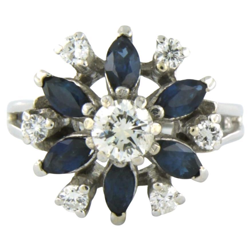 Ring with sapphire and brilliant cut diamonds up to 0.56ct 14k gold 4.6 grams