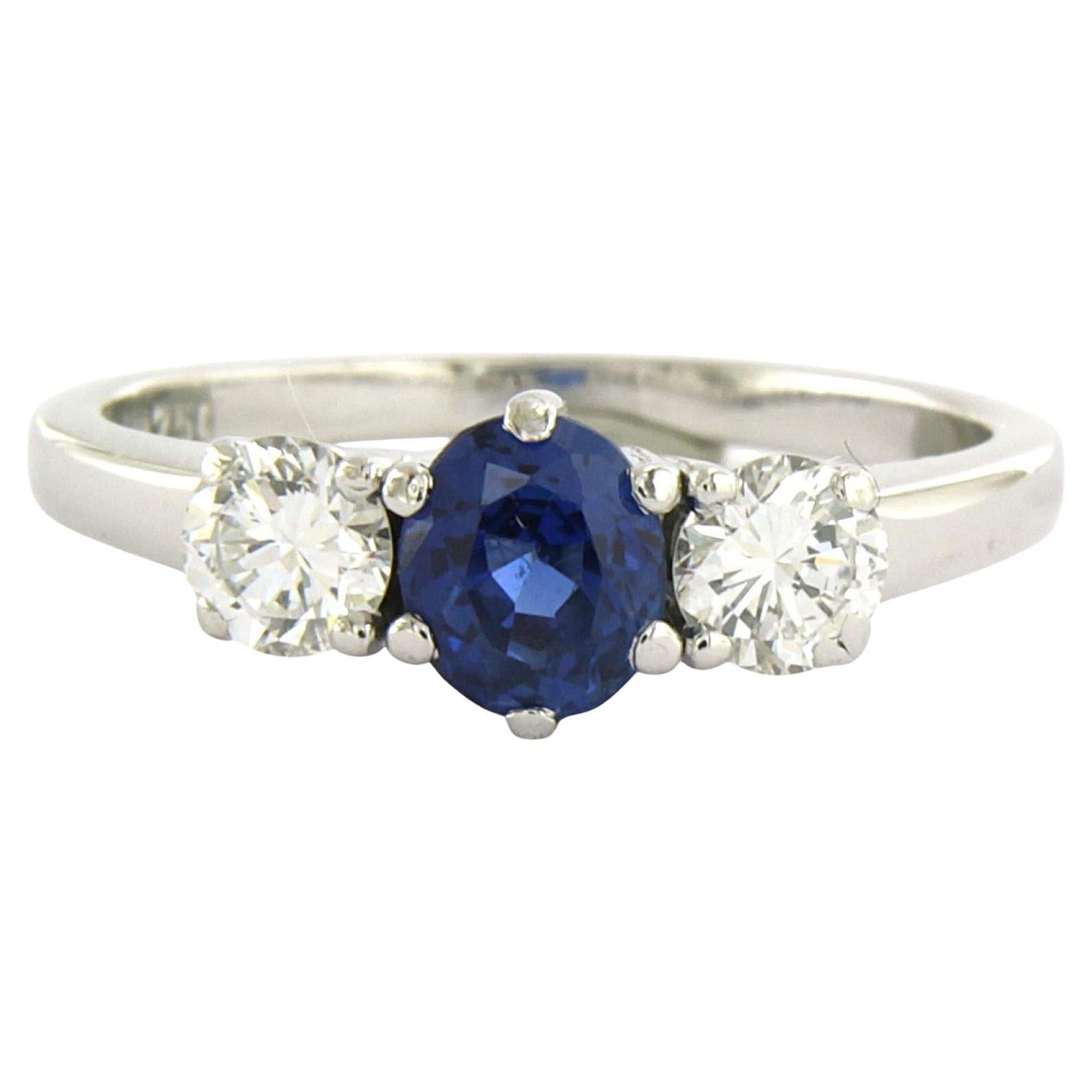 Ring with sapphire and brilliant cut diamonds up to 0.60ct 18k white gold