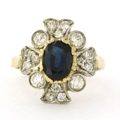 Ring with sapphire and brilliant cut diamonds up to 0.75ct 18k gold and silver