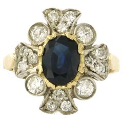 Ring with sapphire and brilliant cut diamonds up to 0.75ct 18k gold and silver