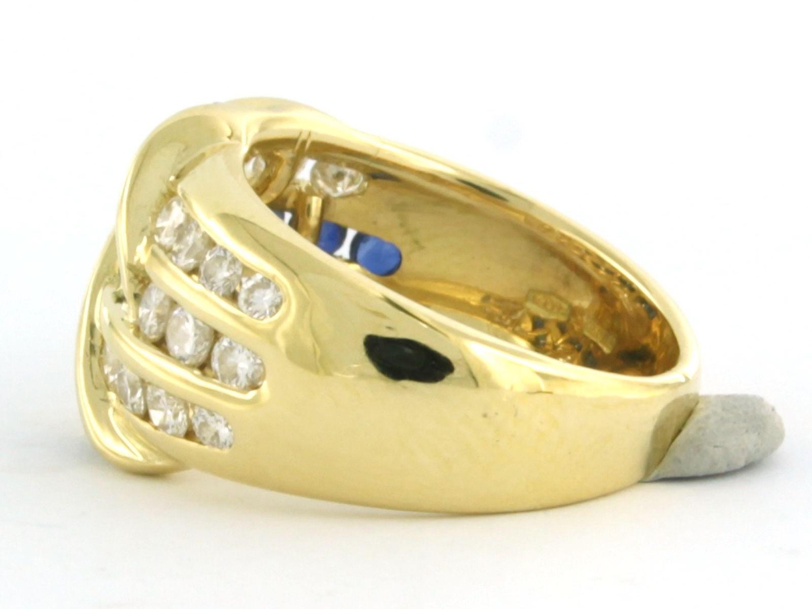 Ring aus 18k Gelbgold, besetzt mit Saphir und Diamant im Brillantschliff 0,78 ct F/G - VS/SI - Ringgröße US 5.25 - EU 16 (50)

ausführliche Beschreibung

die Oberseite des Rings ist 1,2 cm breit

Gewicht 8,5 Gramm

Ringgröße US 5.25 - EU 16 (50),