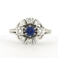 Ring with sapphire and brilliant cut diamonds up to 0.88ct 18k gold 4.6 grams