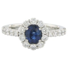 Ring with sapphire and brilliant cut diamonds up to 0.90ct 18k white gold