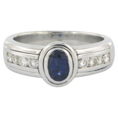 Ring with sapphire and diamond 18k white gold