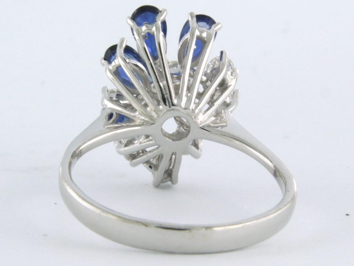 Brilliant Cut Ring with sapphire and diamonds 14k white gold
