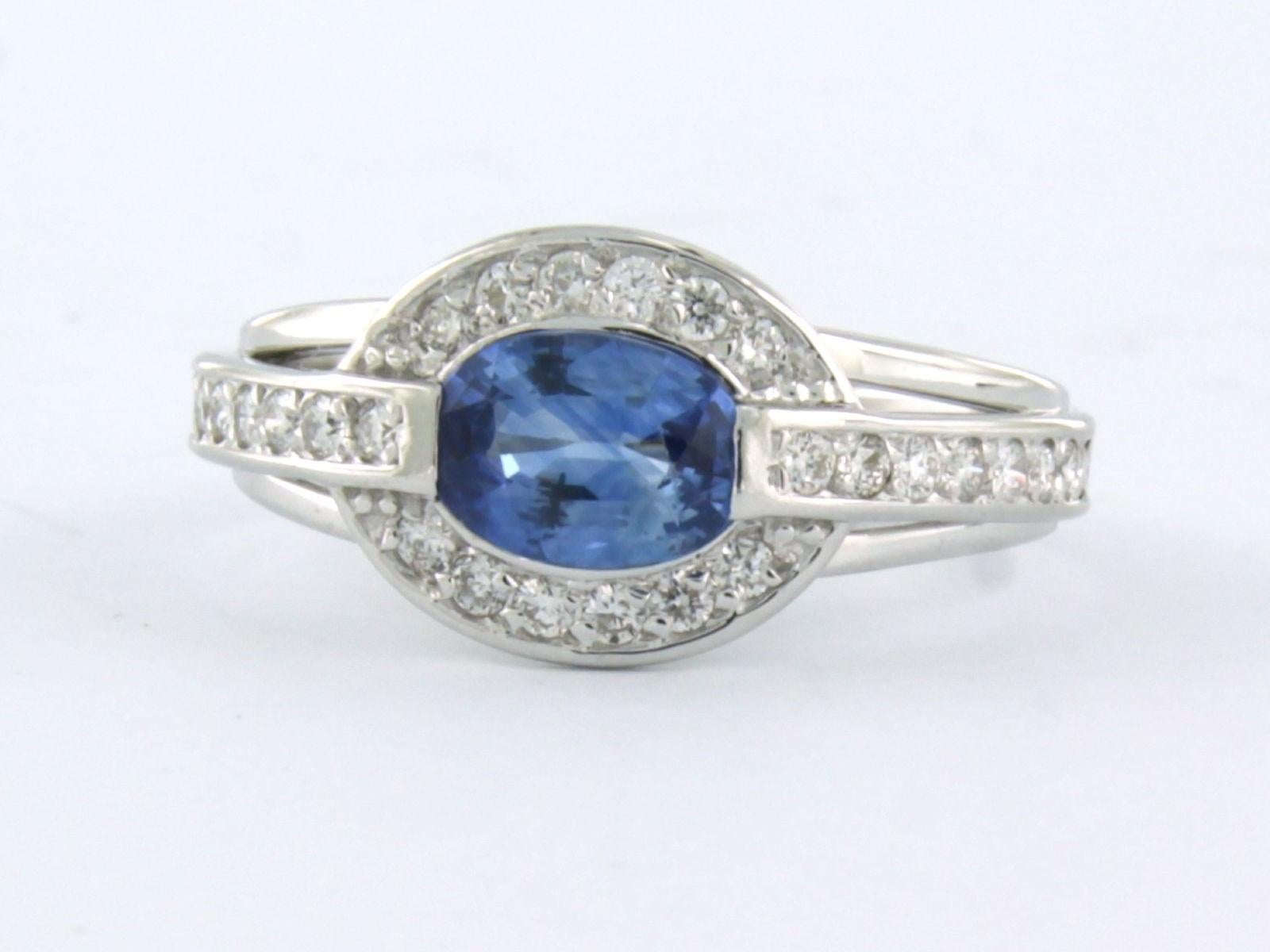 Brilliant Cut Ring with Sapphire and Diamonds 14k white gold