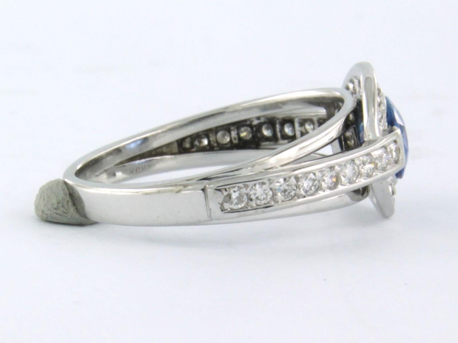 Women's Ring with Sapphire and Diamonds 14k white gold