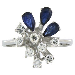 Ring with sapphire and diamonds 14k white gold