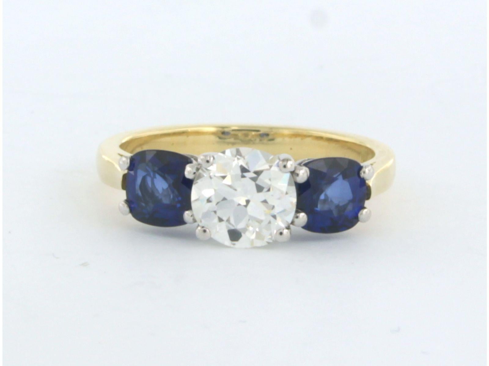 18k bicolor gold ring with an old European cut diamond in the center. 1.10ct - J/K - US - and cushion cut sapphire 1.42ct - ring size US. 6.75 - EU. 17.25 (54)

detailed description:

the top of the ring is 6.5 mm wide by 6.6 mm high

ring size US