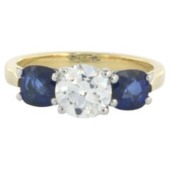 Ring with sapphire and diamonds 18k bicolour gold