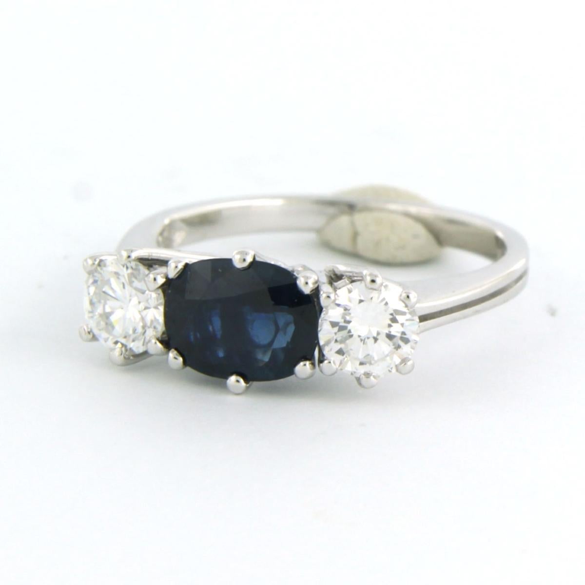 Brilliant Cut Ring with sapphire and diamonds 18k white gold For Sale