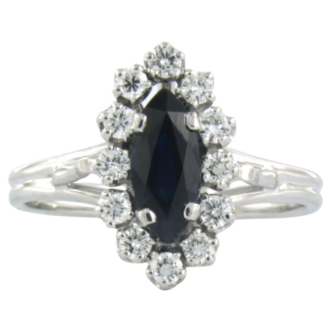 Ring with sapphire and diamonds 18k white gold