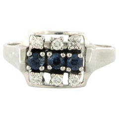 Ring with sapphire and diamonds 18k white gold