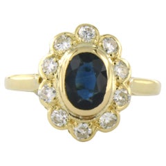 Anillo con zafiro y diamantes oro amarillo 18k